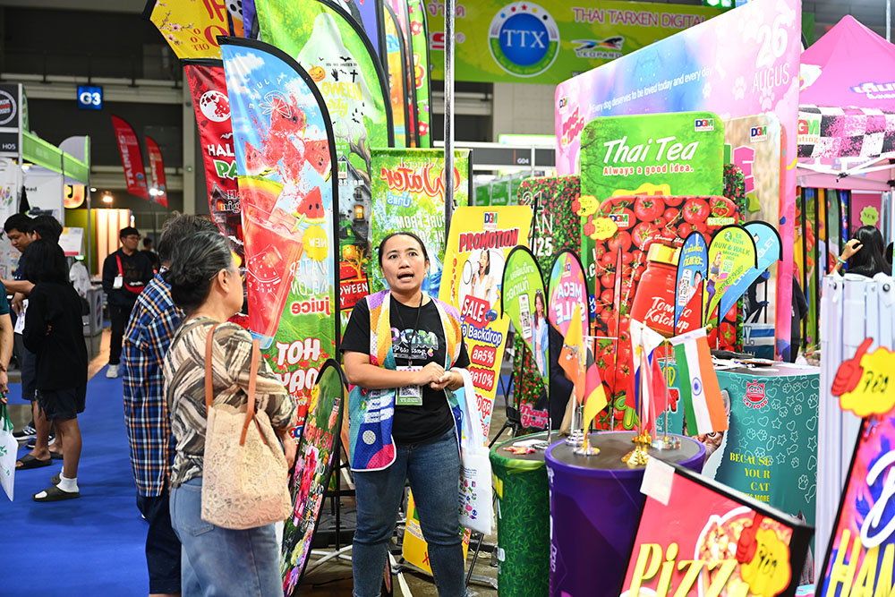 Bangkok Ad and Sign Expo exhibition floor showing signage and advertising production exhibits
