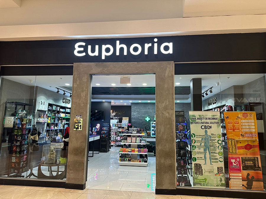 Face-lit fabricated channel letters installed on a commercial storefront fascia