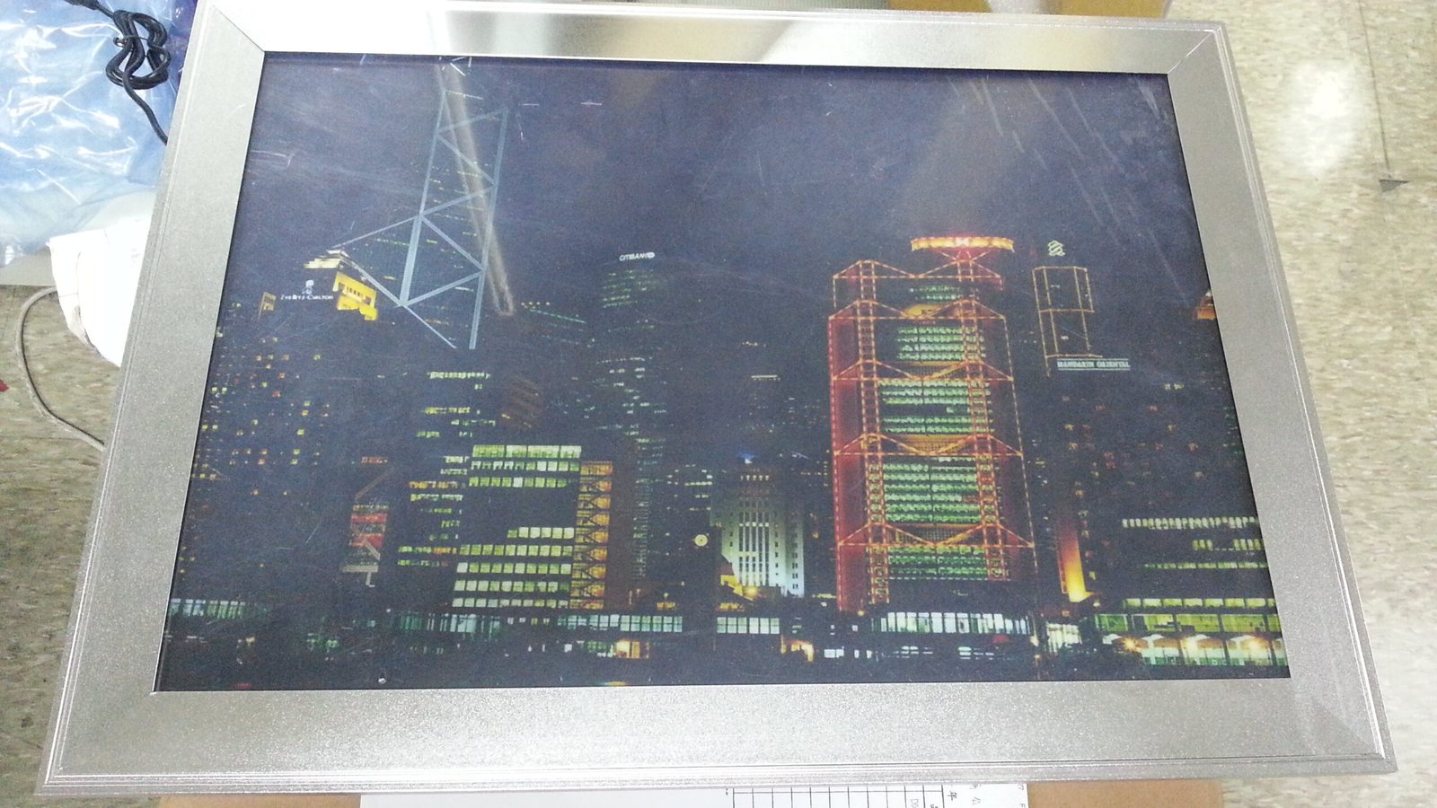 Hinged slim light box with printed cityscape face