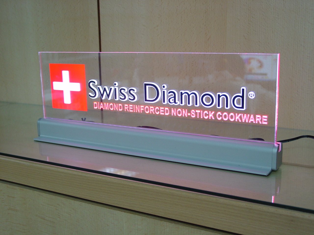 Swiss Diamond — counter light box nameplate